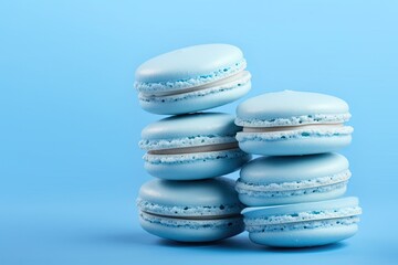Fototapeta na wymiar Blue macarons with a French touch on a matching backdrop