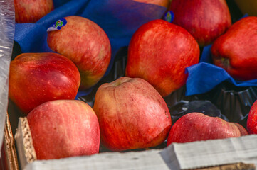 apples in a box near a store in the village 1