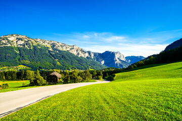 View of the landscape in Styria near Lake Grundlsee. Nature in Austria with meadows and mountains.
