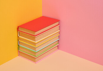 A stack of books and schoolwork. Knowledge and copy space for text.
