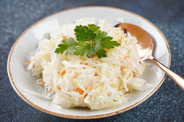 Sauerkraut - fermented cabbage with carrot  in the bowl