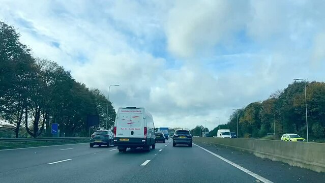 Hyperlapse car driving pov on M62 motorway in Manchester on cloudy day