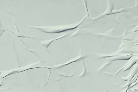 A sheet of white crumpled paper. Abstract background for design.