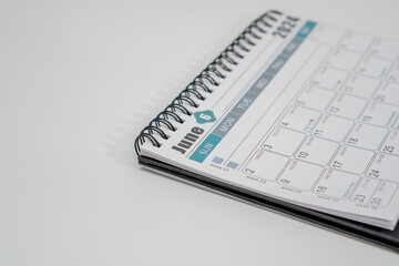 Desk calendar of 2024. June page of a calendar on a white background. Business idea. Planning idea. 