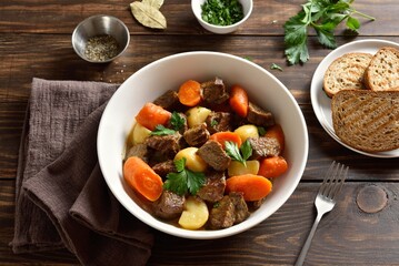 Beef meat stewed with potatoes, carrots and spices