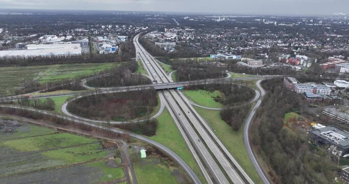 Birds eye aerial drone view of an intersection at the german autobahn,Bremen, Germany. Transportation and mobility. Unlimited speed limit.