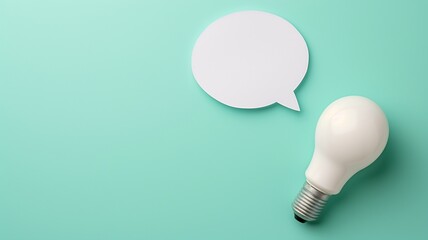 Illuminating Ideas: Light Bulb Beside Blank Speech Bubble on Turquoise Background