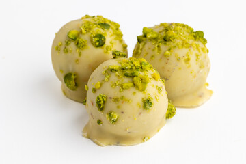 different types of chocolate bonbons on white background