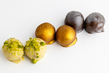 different types of chocolate bonbons on white background