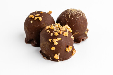 different types of chocolate bonbons on white background
