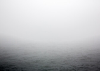 Russia Sakhalin Oblast 28.07.2023 Sea of Okhotsk in the fog. The line of the horizon, dissolving in...