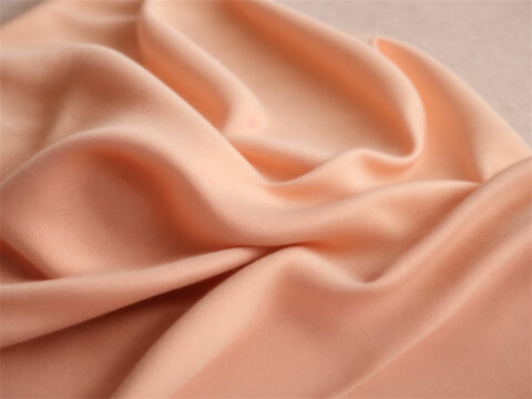 light peach color cashmere fabric background