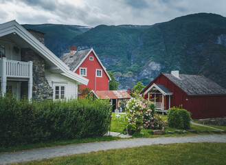 Fototapeta na wymiar Houses in a traditional Norwegian village, Scandinavian architecture. Travel to Norway