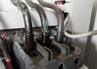 The power cable burns and peels due to overload and results in overheating.