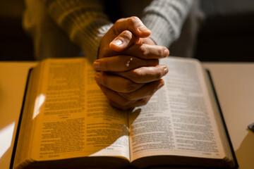 Human person hands worship, Concept of praying to God. Christian religious woman praying at night...