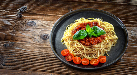 Composition with a plate of spaghetti bolognese