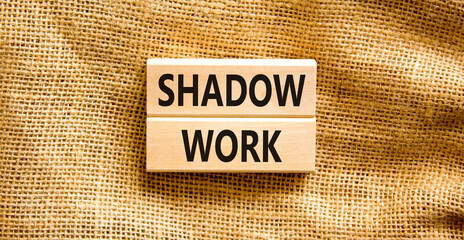Shadow work psychology symbol. Concept words Shadow work on beautiful wooden blocks. Beautiful canvas table canvas background. Psychology shadow work concept. Copy space.