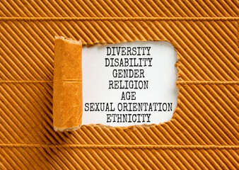 Diversity ethnicity gender age sexual orientation religion disability words written on white paper...