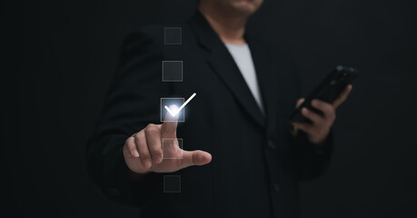 Performance checklist concept : businessman using finger with mobile phone for questionnaire, evaluation, assessment online or survey exam and filling out for digital survey and checklist
