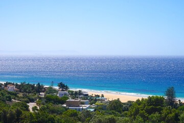 view over luxurious villas towards the Playa Los Alemanes, Atlanterra, Faro de Camarinal, Costa de la Luz, Atlanterra, Andalusia, Spain