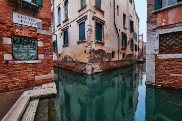 Cityscape and canals of Venice and colorful and old architecture of the city