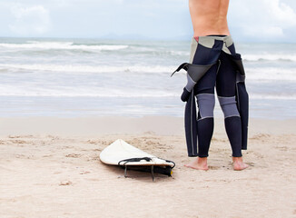 Beach, body or ready to start surfing with surfboard on vacation or adventure for fitness or travel. Back view of athlete, swimwear or man at seaside on holiday in Hawaii or ocean in extreme sports