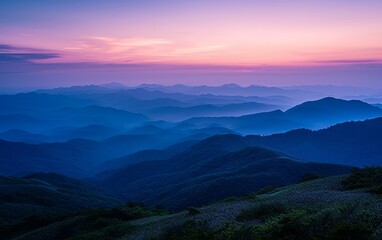 Obraz premium Sunset Over Misty Blue Mountains and Forest