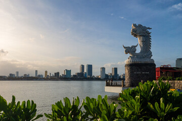 dragon carp statue and the skyline of danang in vietnam