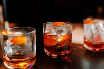 Alcohol cocktail drink on the table, whiskey and rum coctail on the bar counter.