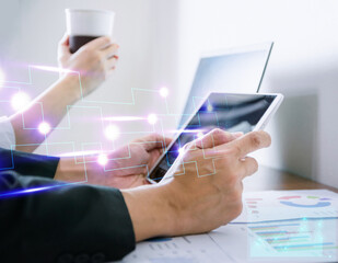 Young office worker sitting and working using a tablet Technology