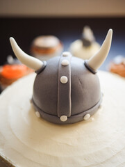 close-up Viking Helmet topper on Birthday cake 