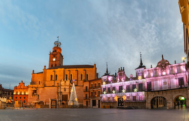 Main square of the Castilian town of Medina del Campo, Valladolid, decorated with Christmas lights. - 714068895