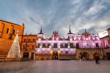 Main square of the Castilian town of Medina del Campo, Valladolid, decorated with Christmas lights. - 714068899
