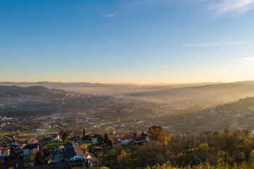 Panorama view of the skyline of the Galician city of Ourense at dusk as seen from the outskirts. - 714069876