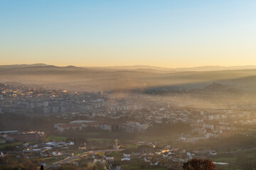 Panorama view of the skyline of the Galician city of Ourense at dusk as seen from the outskirts. - 714069890