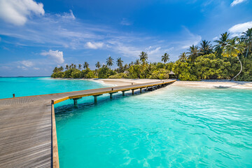 Maldives paradise panoramic coast. Tropical aerial seascape closeup wooden pier water villas, amazing sea happy sky. Exotic nature. Tranquil travel landscape peaceful bright summer vacation background