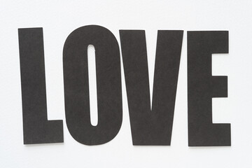 simple machine-cut paper sign with the word 