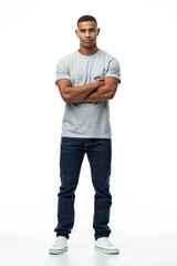 Naklejka premium Casually dressed man in gray t-shirt, blue jeans, white sneakers. Sharp, hyper-realistic stock image on plain white background. Stylish, minimalist, modern fashion model in 20s