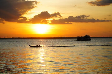 Impressive sunset with the Rio Negro in Manaus, federal state Amazonas, Brazil.