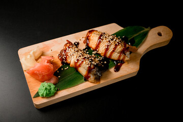 Top view of eel with teriyaki on a leaf