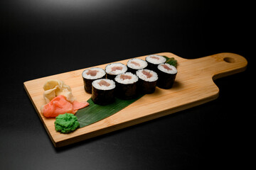 Sushi set platter on wooden surface