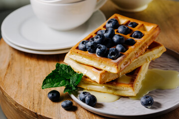 Viennese waffles with blueberries.