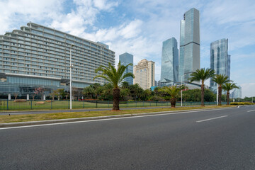 Car background, empty roads and skyscrapers in the financial district, Xiamen, China