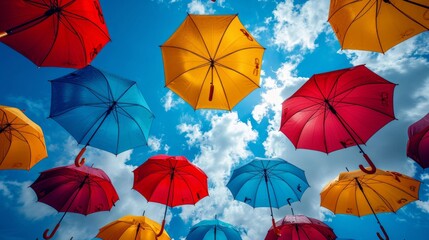 colorful umbrellas floating against a vibrant sky, symbolizing imagination and creativity