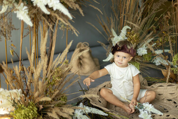 small child in a costume and fairy-tale decorations