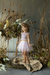 little elf girl in flowers