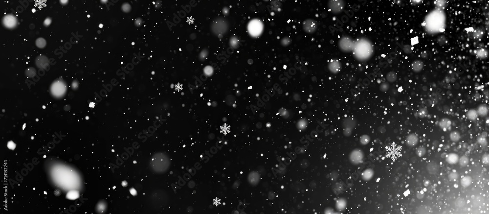 Poster overlay abstract black texture with falling snowflakes onto any object against a real snow backgroun