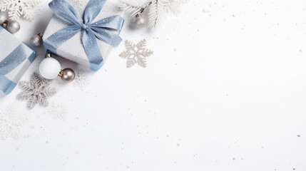 Obraz na płótnie Canvas Christmas Day Concept: Top View Photo of Trendy Blue, White, and Silver Baubles, Gift Boxes, and Fir Branches in Snow on Isolated White Background with Copy-Space for Text or Promotional Content.