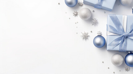 Christmas Day Concept: Top View Photo of Trendy Blue, White, and Silver Baubles, Gift Boxes, and Fir Branches in Snow on Isolated White Background with Copy-Space for Text or Promotional Content.