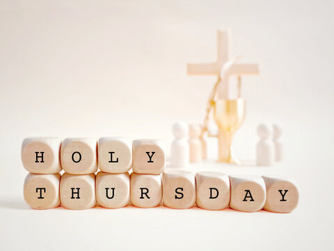 Lent Season, Holy Week and Maundy Thursday Concept - Holy Thursday text on wooden cubes background.